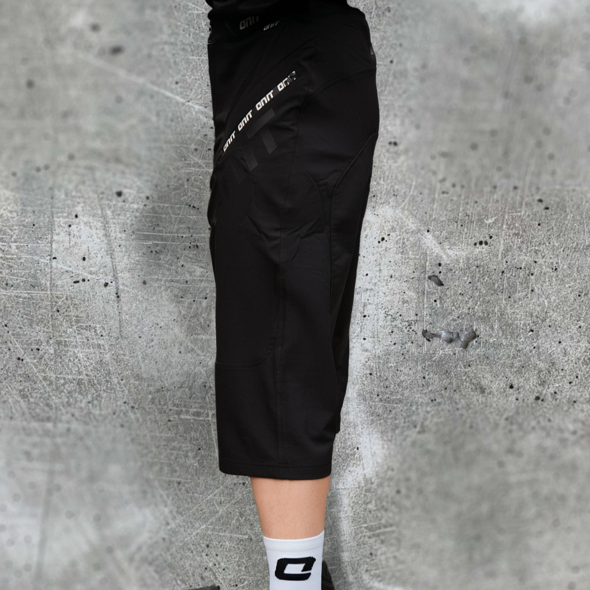 ONIT Black 3/4 length MTB shorts, side view