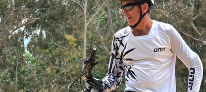 ONIT MTB rider wearing Bamboo long sleeve jersey on mountain bike trail