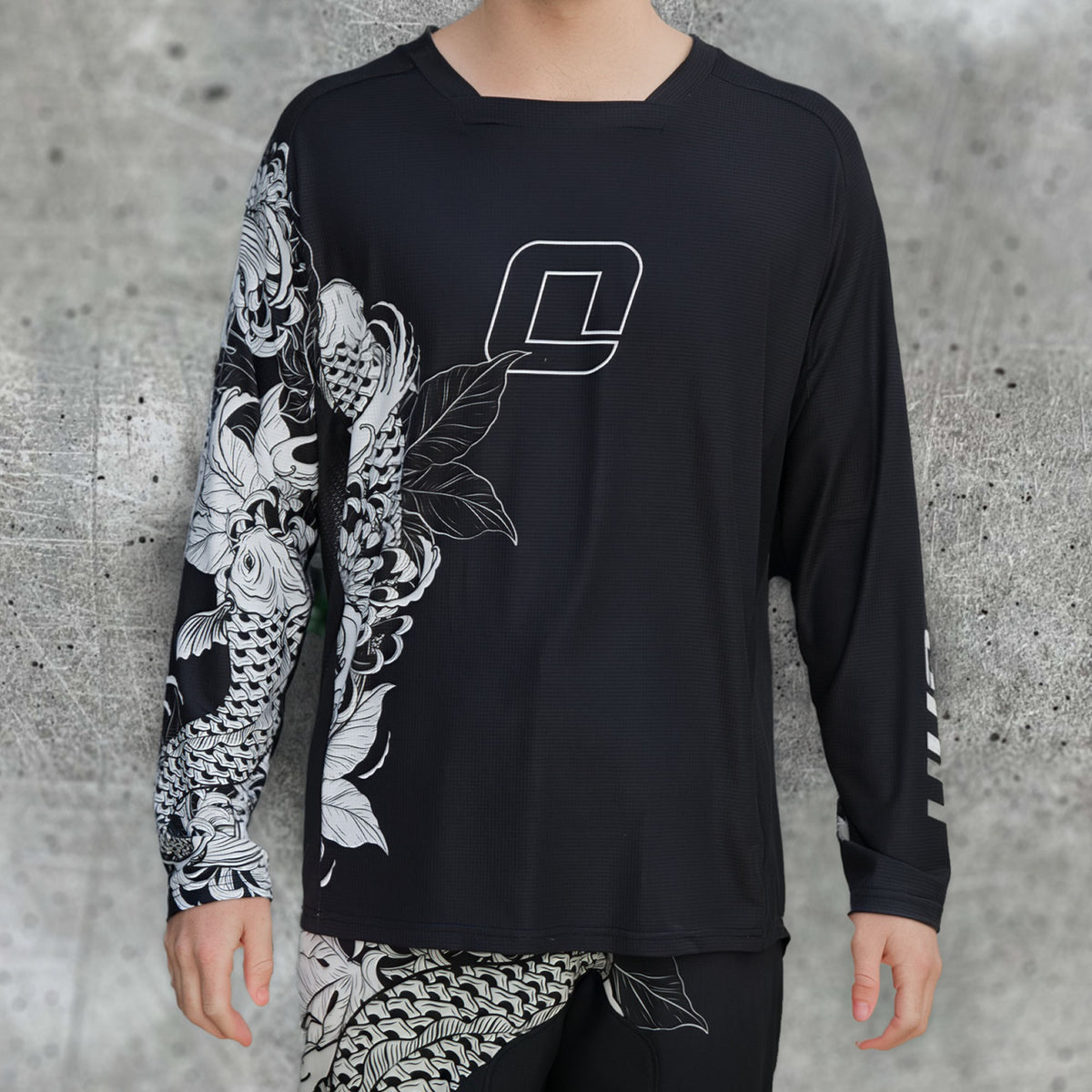 ONIT Black MTB jersey with white fish graphic, long sleeve front view