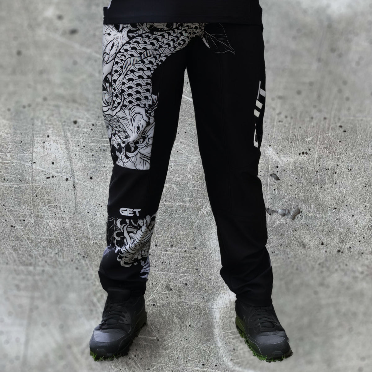 ONIT MTB pants with fish graphic panel, front view