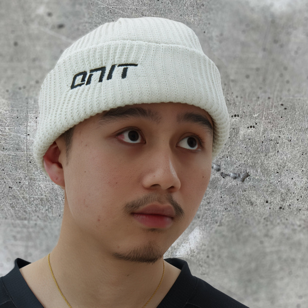 ONIT Cream MTB beanie with logo, worn by model