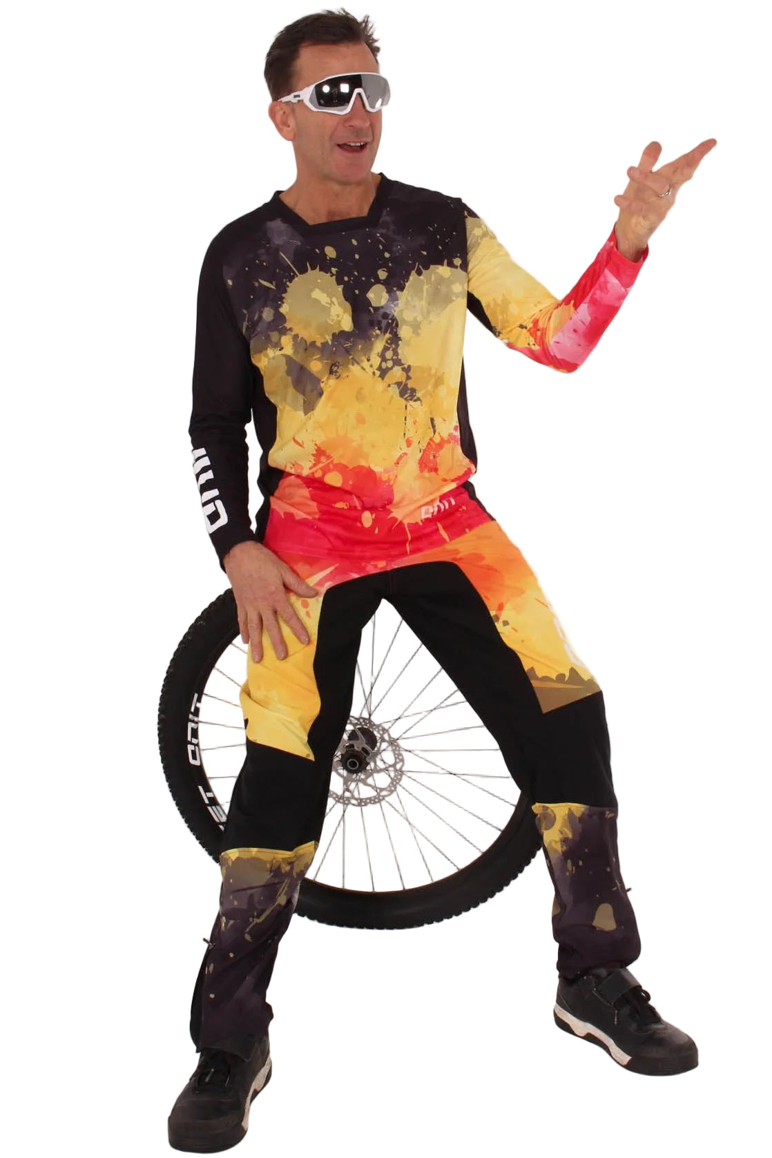 ONIT Black MTB jersey with orange and red paint splash print hero shot