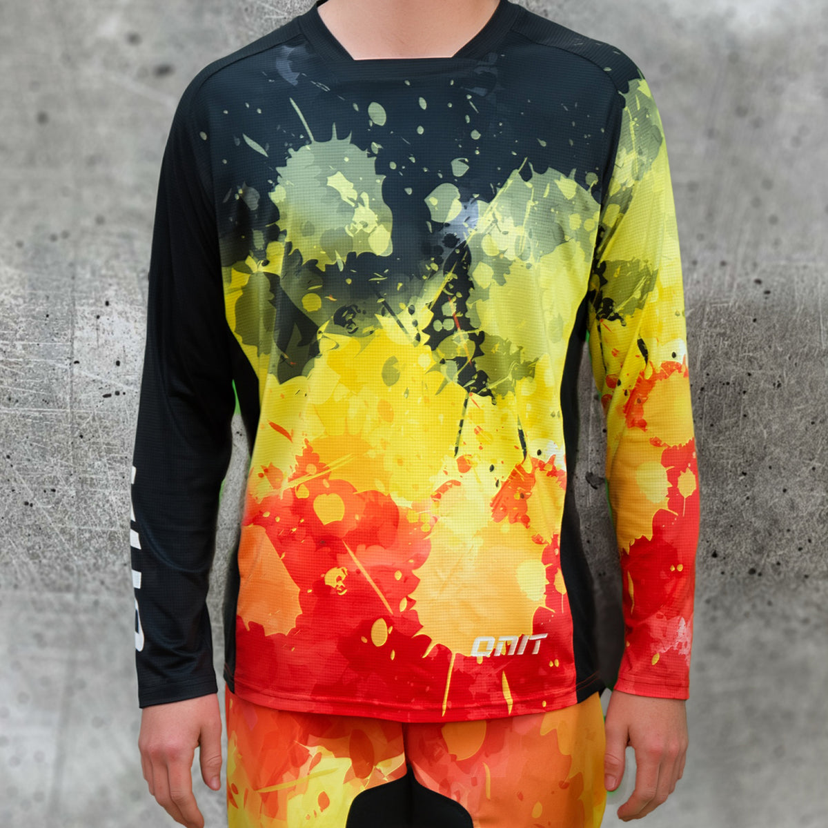 ONIT Black MTB jersey with orange and red paint splash print