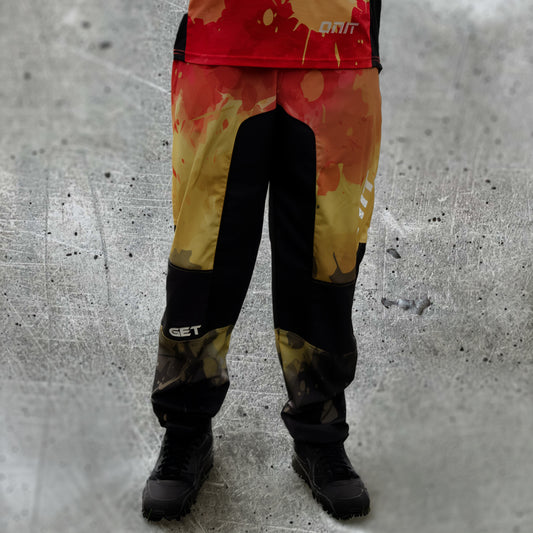 ONIT Black MTB pants with orange and red paint splash panel