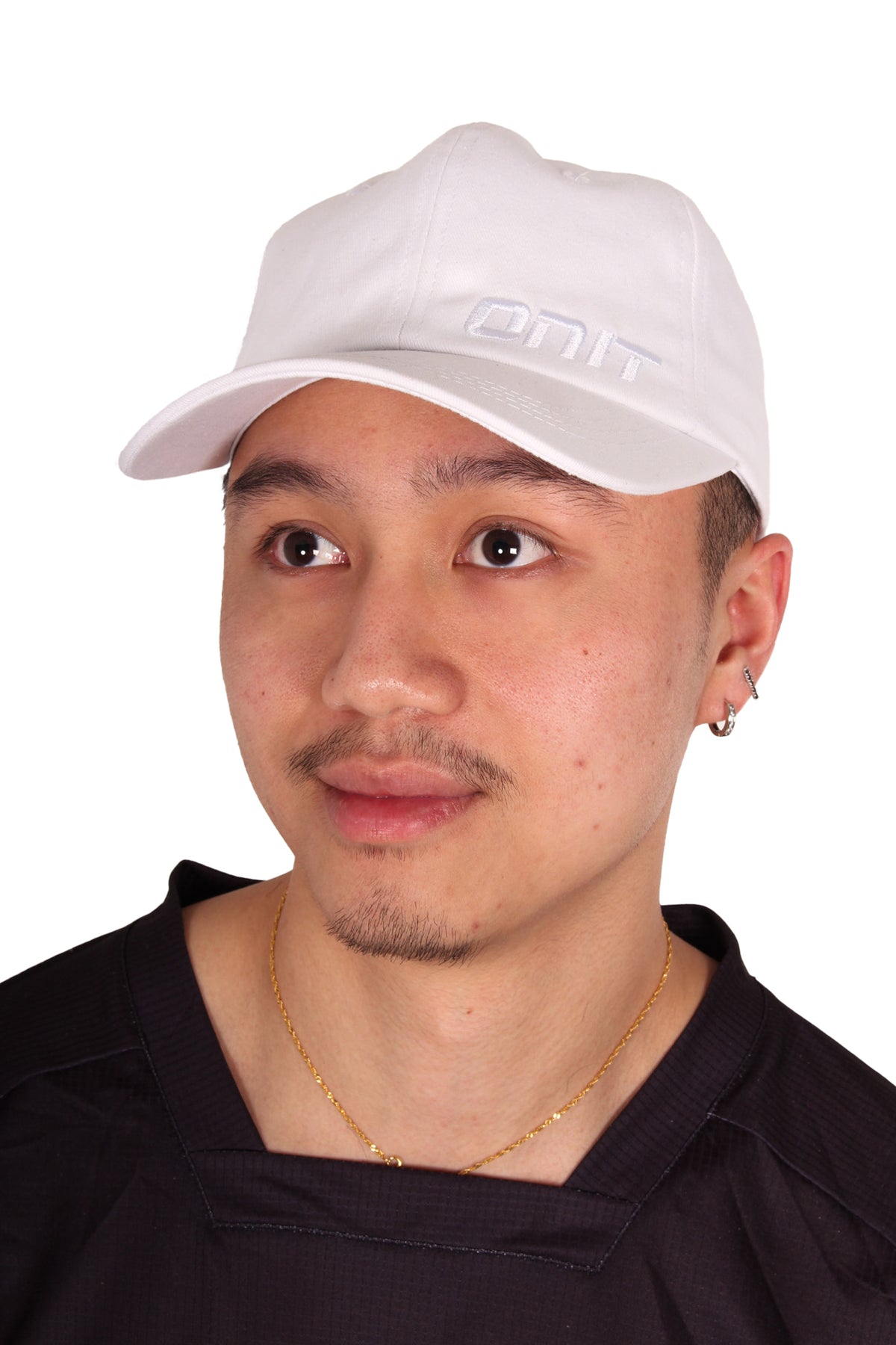 ONIT White on White MTB cap with logo, worn by model
